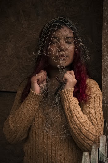 Woman in Brown Sweater