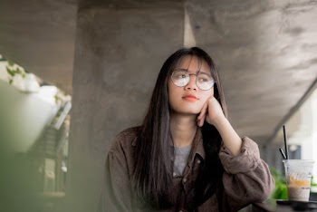 Woman in Brown Top