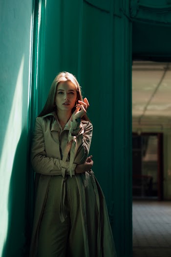 Woman in Brown Trench Coat