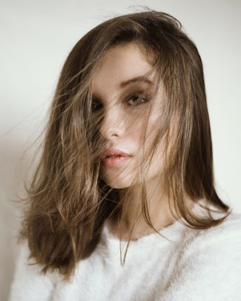 Woman In Crew Neck Sweater