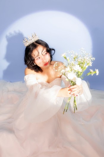 Woman in Crown with Flowers