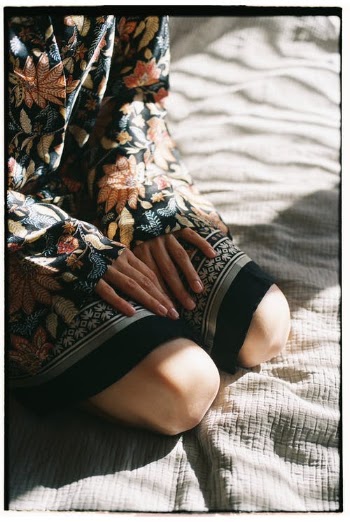 Woman in Floral Dress Kneeling · Free Stock Photo