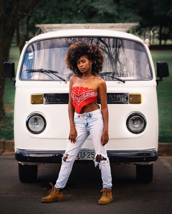 Woman In Front Of A Van