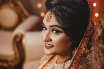 Woman in Gold and Beige Traditional Dress