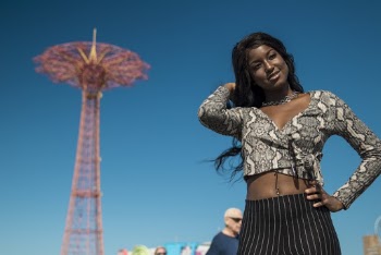 Woman in Gray and White Long-sleeved Crop-top