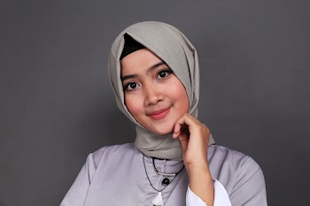 Woman in Gray Hijab in Gray Background