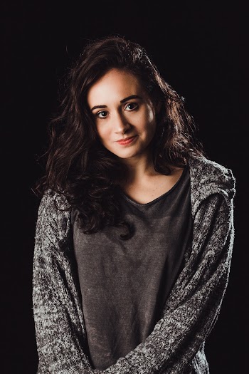 Woman in Gray Long-sleeved Top