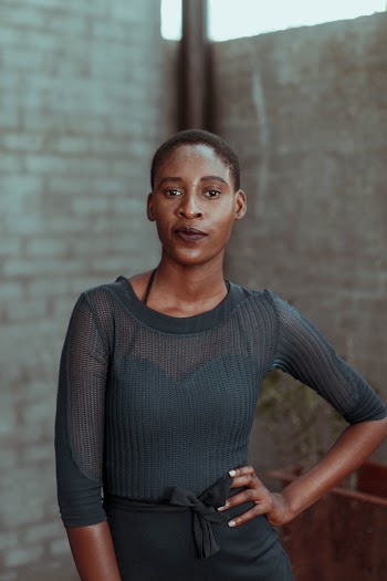Woman in Gray Quarter-Sleeved Shirt