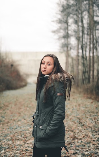 Woman in Gray Zip-up Hooded Jacket