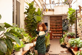 Woman In Green and Black Plaid shirt