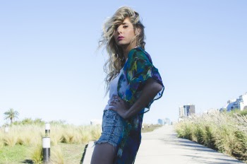 Woman in Green and Blue Cardigan