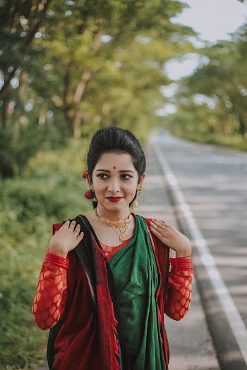 Woman in Green and Red Traditional Indian Dress