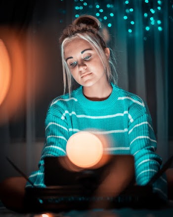Woman in Green and White Striped Sweater