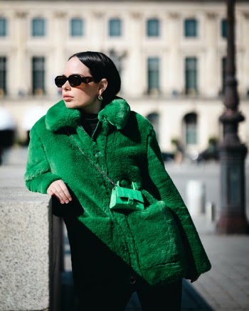 Woman in Green Coat Wearing Black Sunglasses · Free Stock Photo