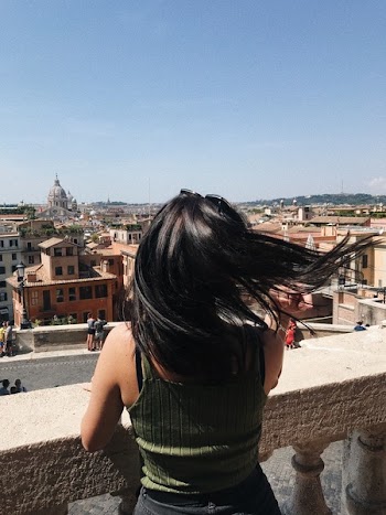 Woman in Green Top Looking the View