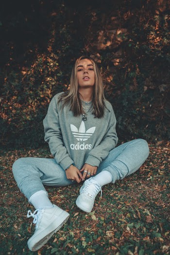 Woman In Grey Adidas Sweater