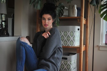 Woman In Grey Sweatshirt