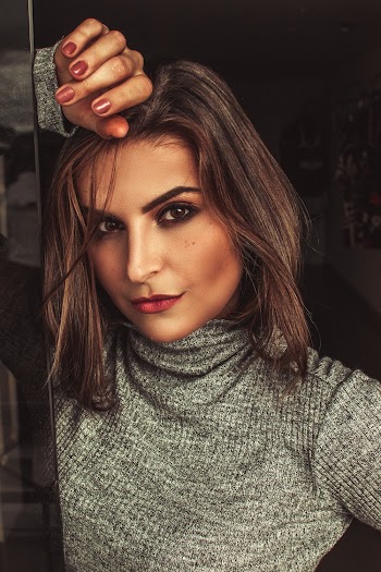 Woman In Grey Turtleneck Shirt