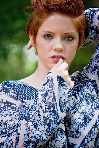 Woman in in Blue and White Floral Long Sleeve Shirt