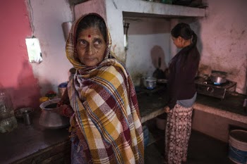 Woman in local kitchen, Kumrose, | Free Photo - rawpixel