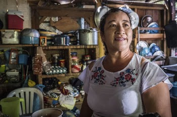 Woman in local kitchen, Uaxactun, | Free Photo - rawpixel