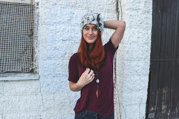 Woman in Maroon Top and Bluejeans