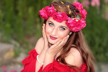 Woman in Off Shoulder Blouse and Pink Rose Headdress