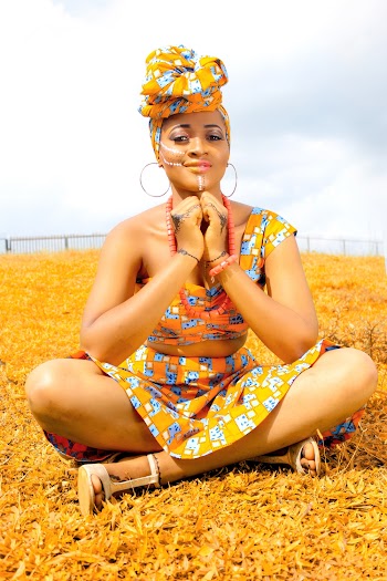 Woman In Orange Printed Wear
