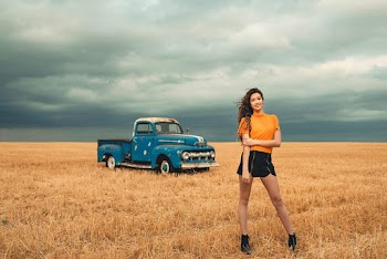Woman In Orange Shirt