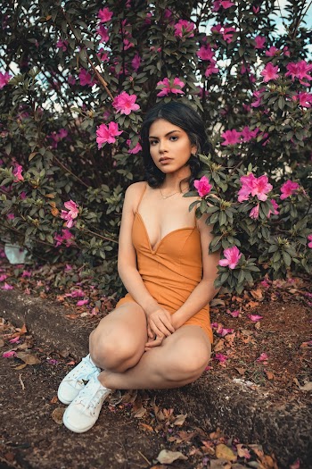 Woman in Orange Spaghetti Strap Dress