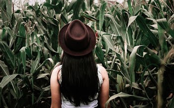 woman in photo shoot with plants background
