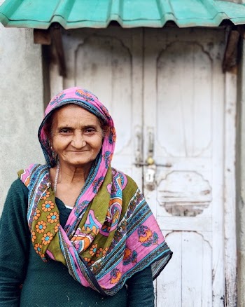 Woman in Pink and Green Headscarf