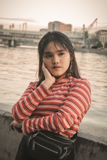 Woman In Pink and White Stripe Long Sleeve Shirt