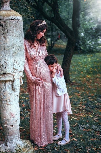 Woman In  Pink Long-sleeved Dress With Child