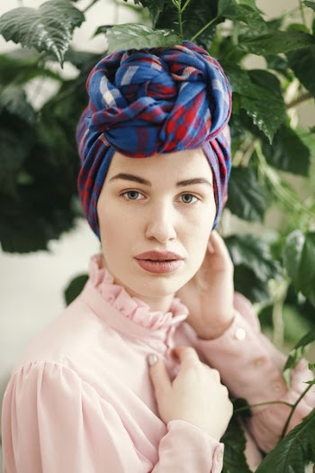 Woman in Pink Long-sleeved Top and Blue and Red Headdress