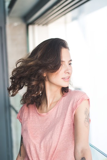 Woman in Pink Scoop-neck T-shirt Posing