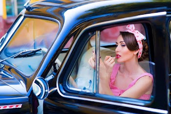 Woman In Pink Sleeveless Dress In A Vehicle