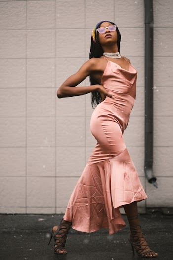 Woman in Pink Spaghetti Strap Dress