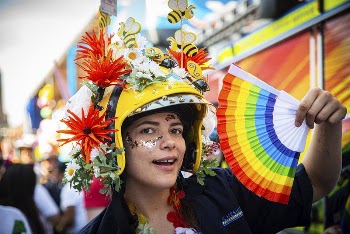 Woman in pride parade, August | Free Photo - rawpixel