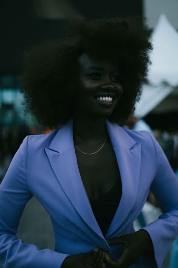 Woman in Purple Peak Lapel Suit Jacket