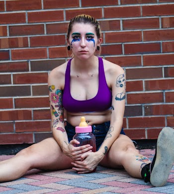 Woman in Purple Sports Bra 