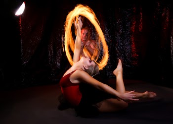 Woman in Red and Black Ballerina Dress With Steel Wool Photography