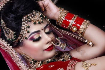 Woman In Red and Gold Jewelries