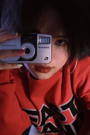 Woman in Red and White Hoodie Holding White Smartphone · Free Stock Photo
