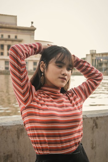 Woman In Red and White Stripe Long Sleeve Shirt