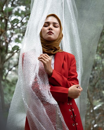 Woman in Red Coat