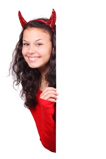 Woman in Red Costume Peeping Behind Wall