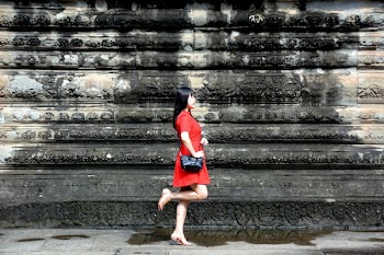 Woman in Red Dress Standing Outdoor