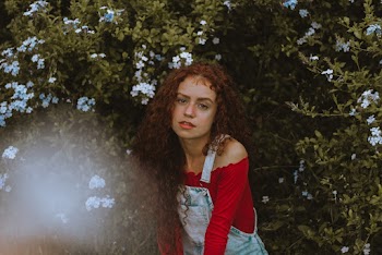 Woman in Red Long-sleeved Top