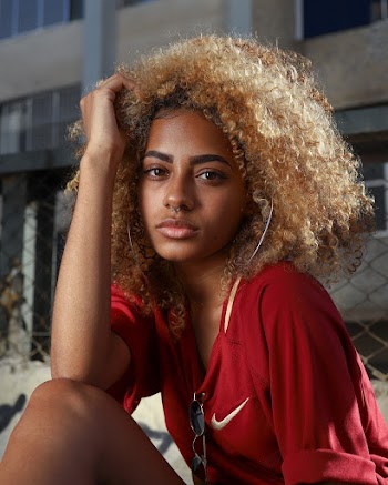 Woman In Red Nike Top